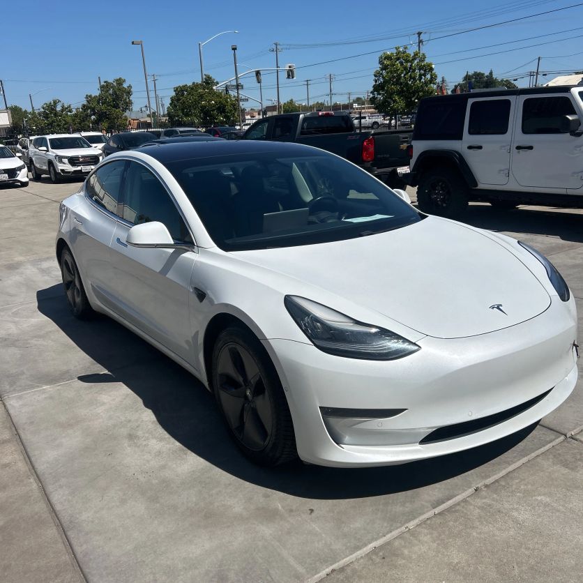 tesla model 3 2018 5YJ3E1EB9JF131302 image tesla model 3 2018 5YJ3E1EB9JF131302 image